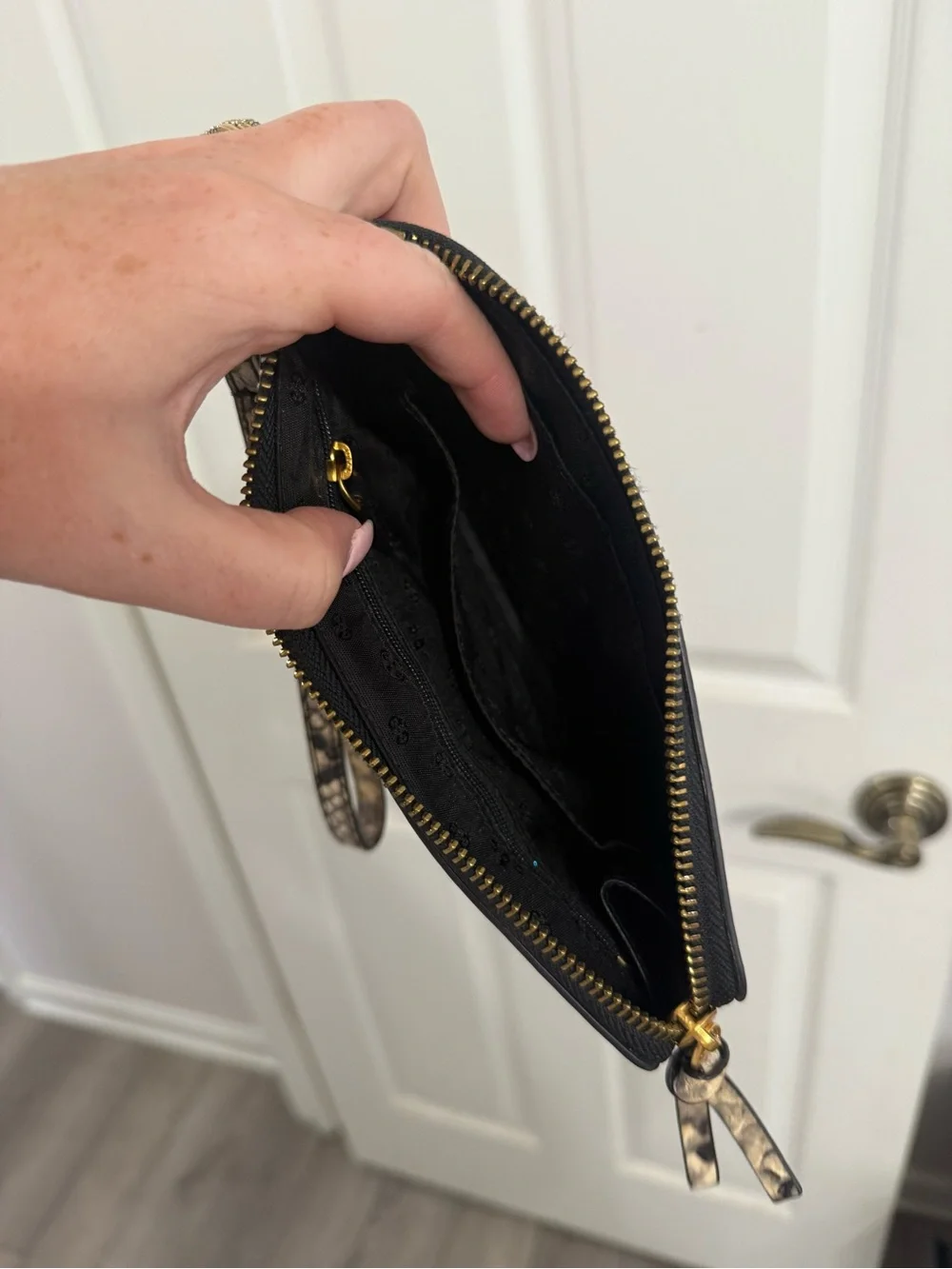 Tory Burch Snake-Print Wristlet in Black and Cream with Gold Logo